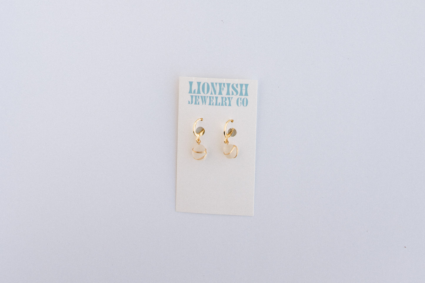 Gold Huggie Hoops with White Glass