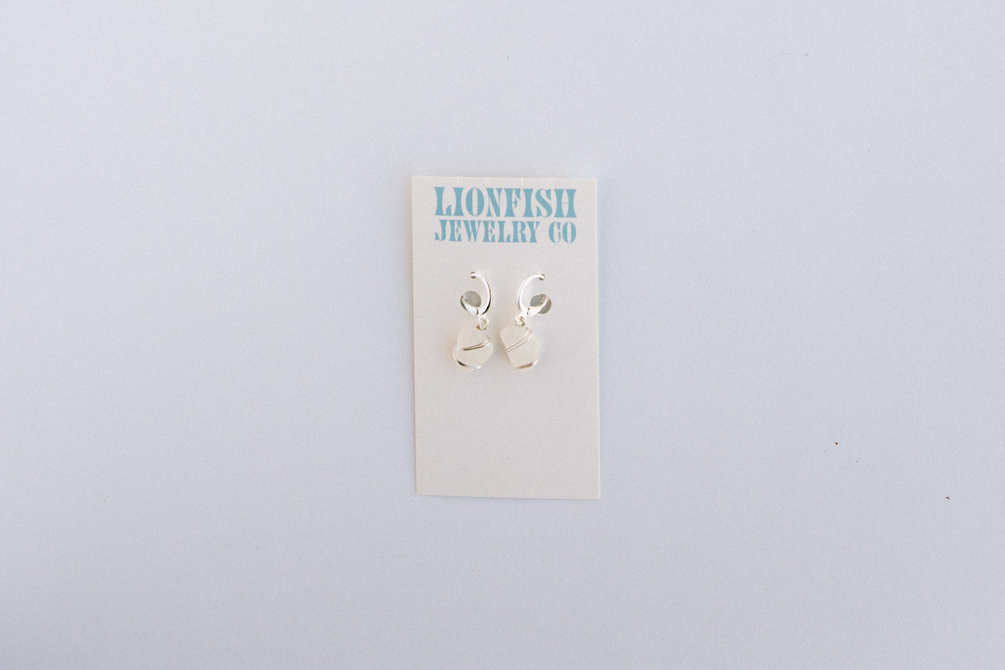 Silver Huggie Hoops with White Glass